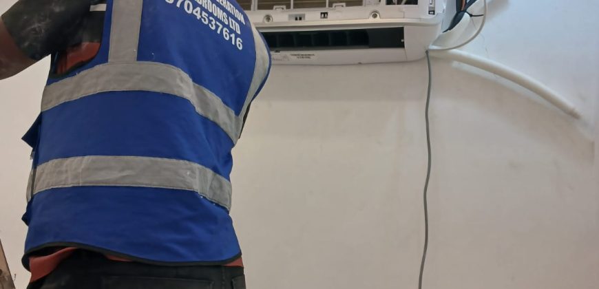 Air conditioning services in Kenya by Magic Refrigeration technicians installing and repairing AC units